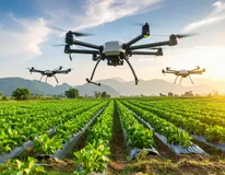 agricultural-drones-flying-over-green-crop-field